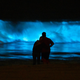 Beachgoers at Dockweiler State Beach, California, admiring the bioluminescent phytoplankton on April 29, 2020.